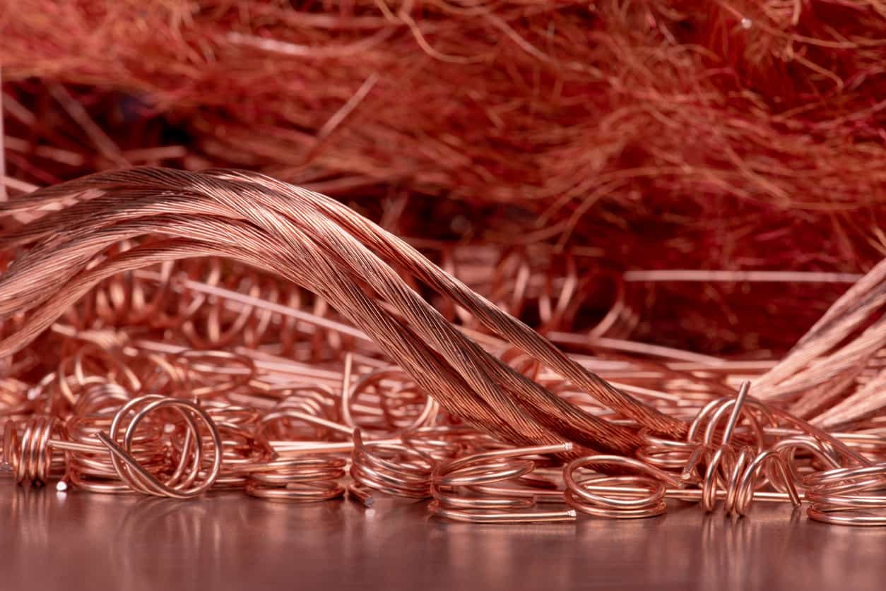 Copper hovers near one-week high, tin pulls back from record
